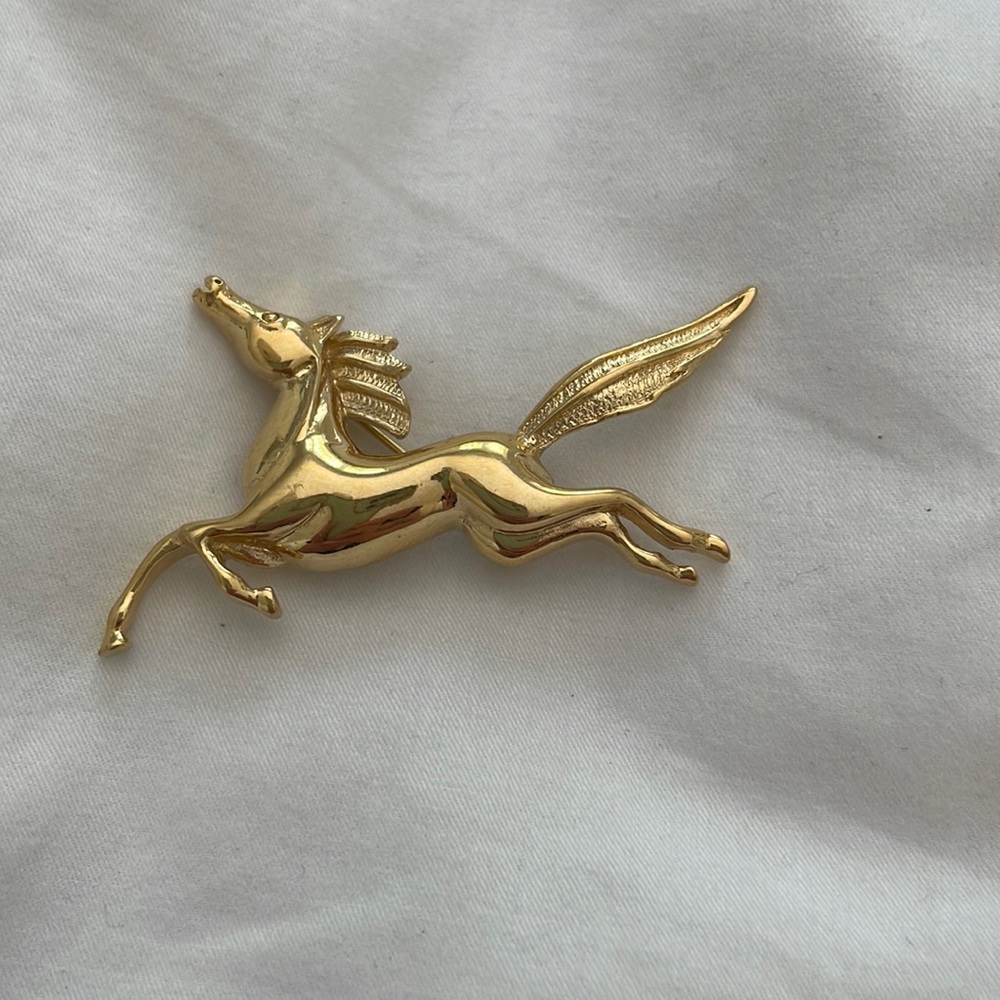 Trifari gold horse broach